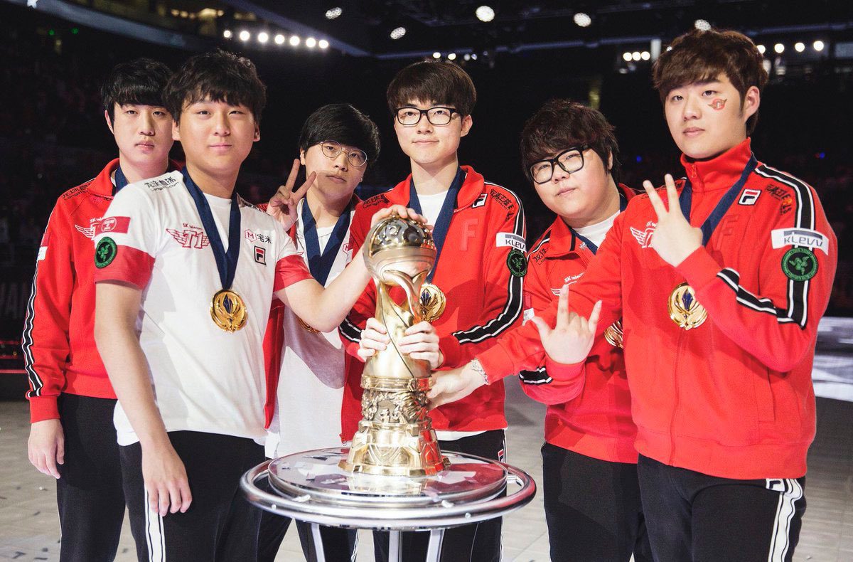 The SKT 2016 lineup beside the MSI trophy; this was the first time SKT won this tournament, adding an international title to their collection