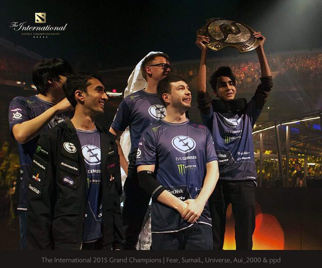 Sumail with Evil Geniuses raising the 'Aegis' after winning TI5
