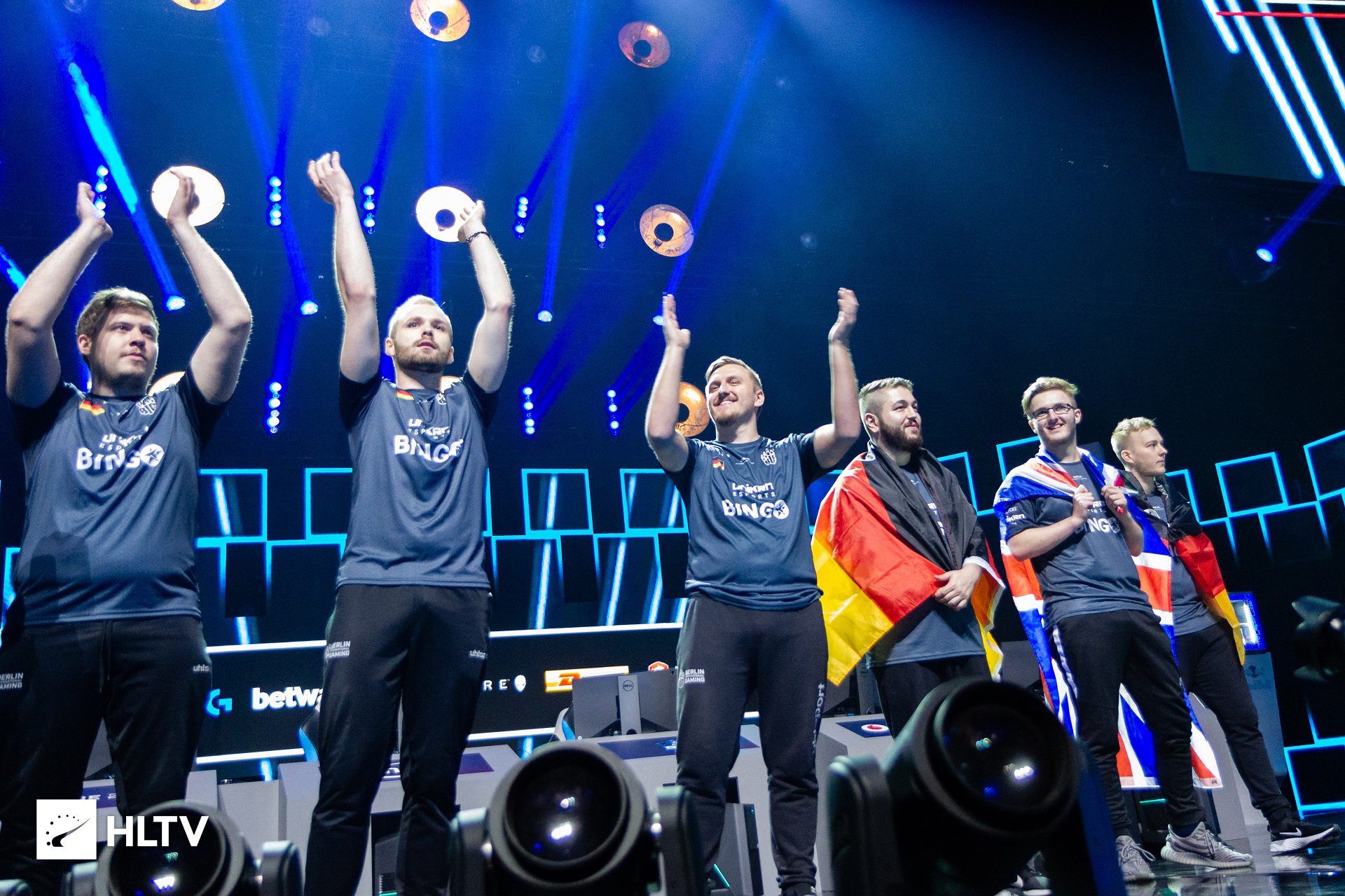 Smooya (second from the right, holding the British flag) with his teammates in the grand final of ESL One Cologne 2018
