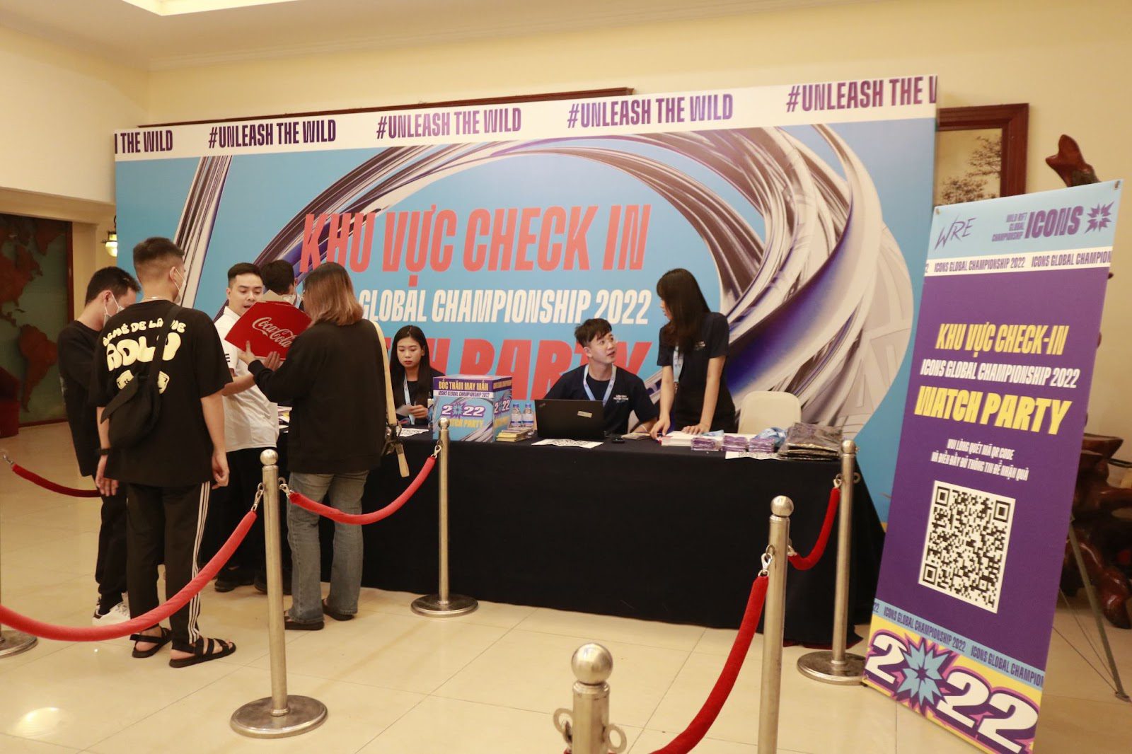 The ticketing booth is clearly organized with enthusiastic support helping fans quickly participate in the event.