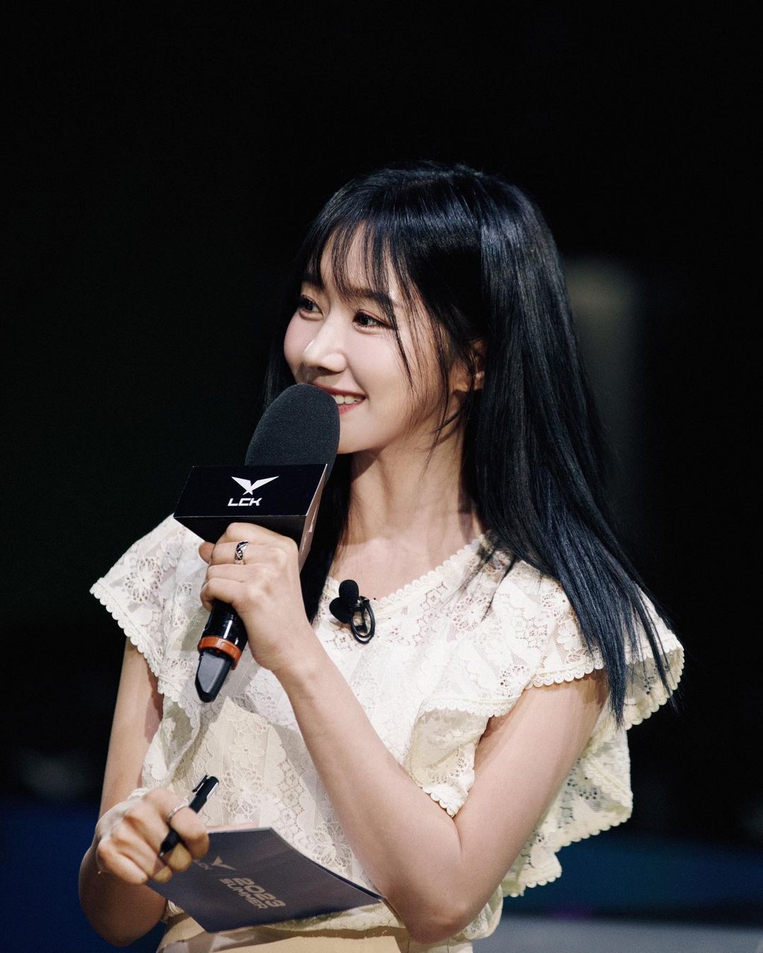 She possesses a gentle beauty with an engaging hosting style