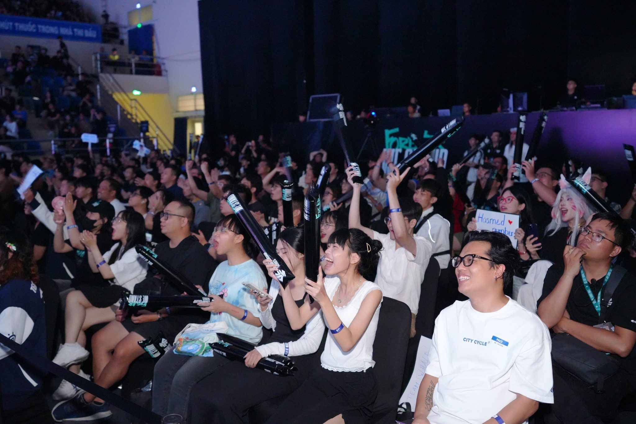 Fans cheer enthusiastically for both teams