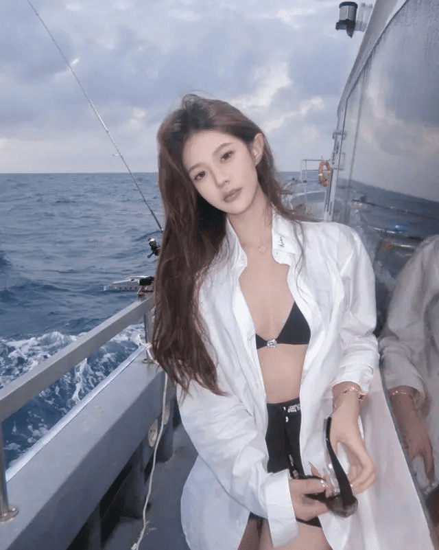 She has a charming face and a sexy figure