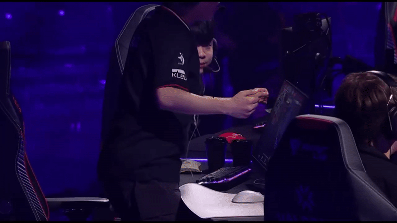 BuZz stands up to trash talk his opponent during the match