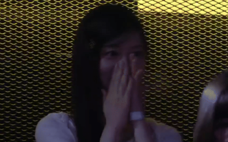 Only appearing as an audience member, Minju attracted attention just as much as the match below.